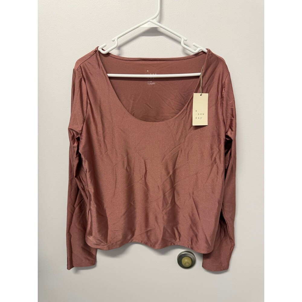 Women’s rose gold long sleeve shirt nwt